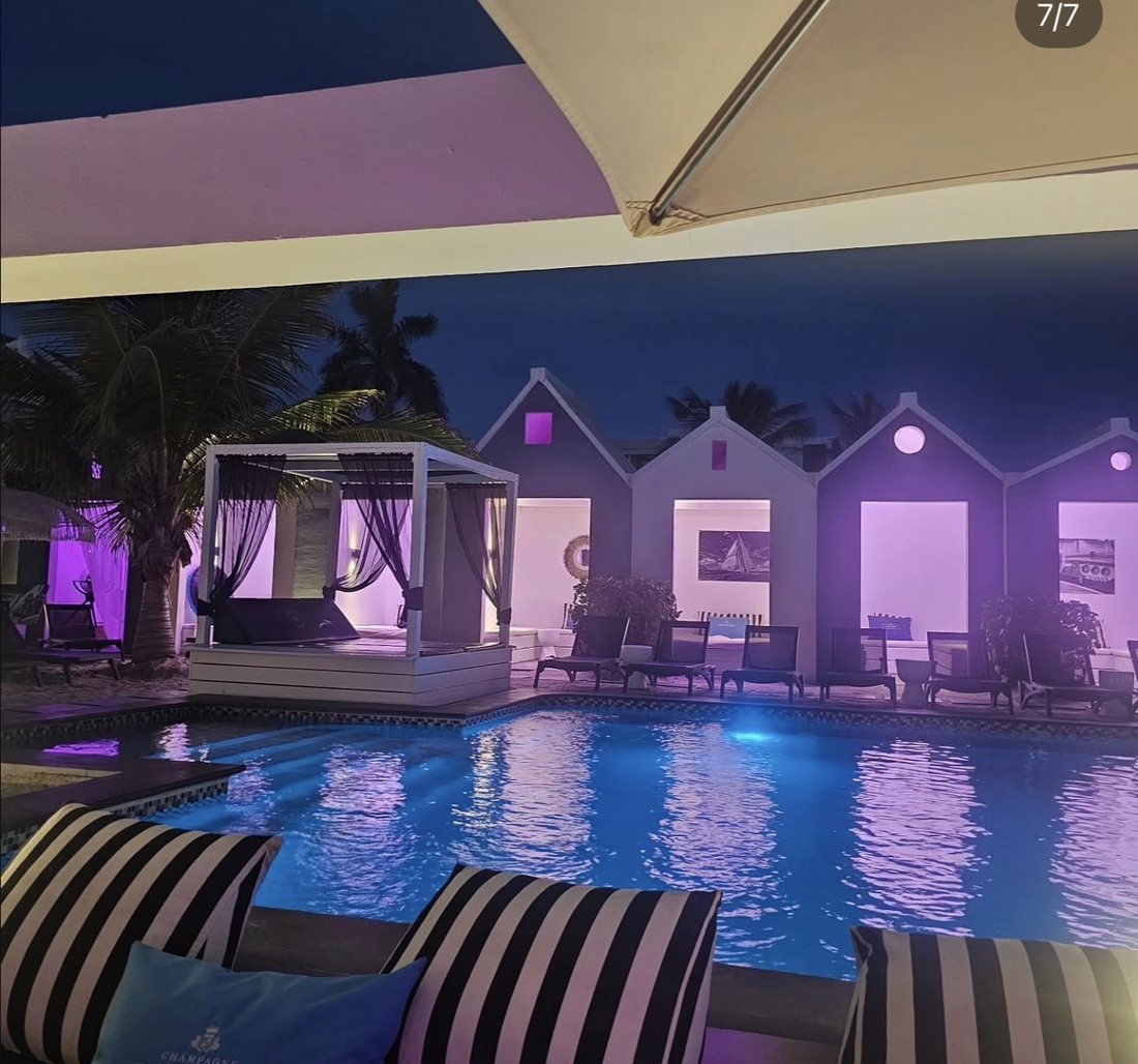 Poolside at Saint Tropez Ocean Club after dark, Pietermaai